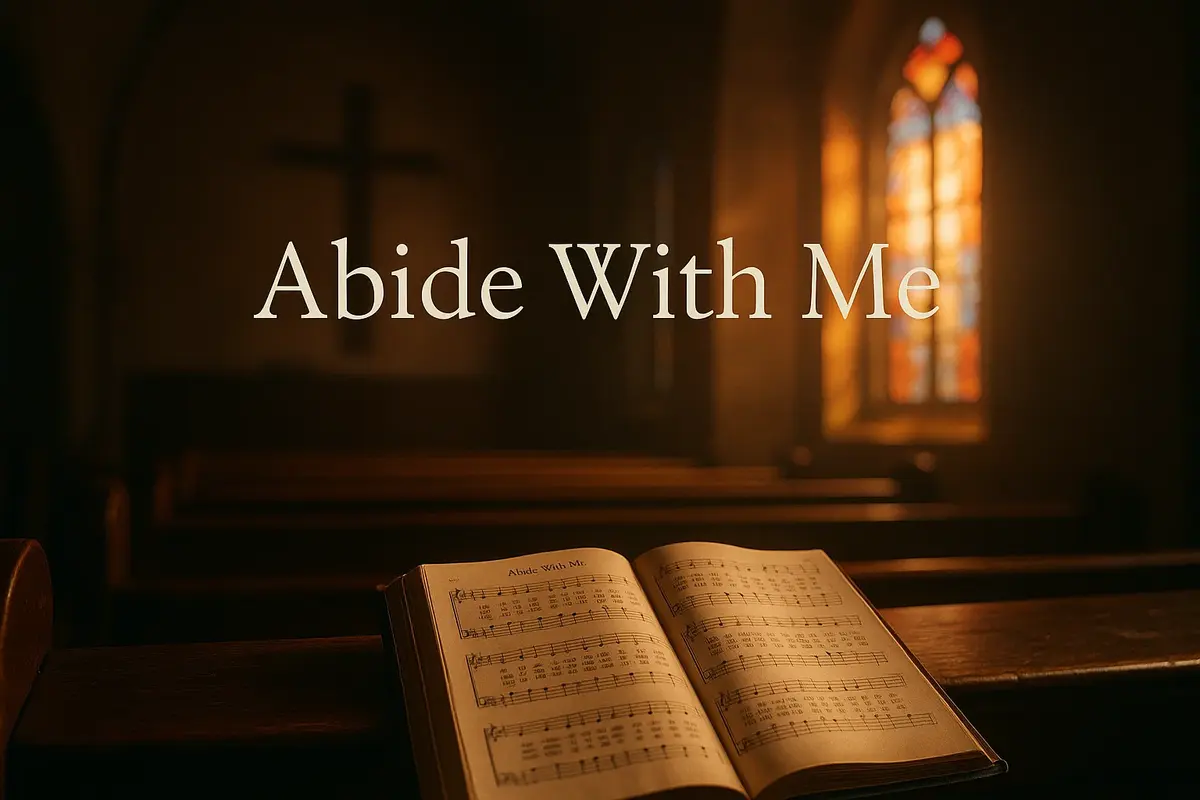 Open hymn book on wooden pew at sunset with warm light and stained glass, inspired by the hymn “Abide With Me”